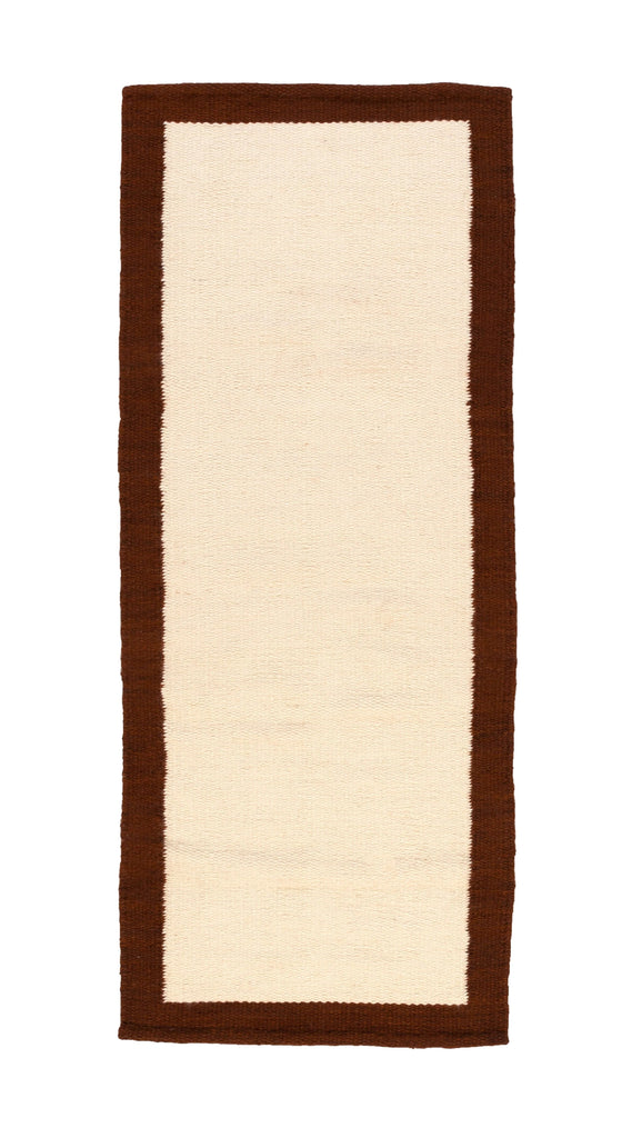 Minimal woven rug with handcrafted finish